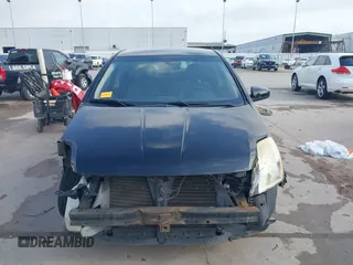 2012 Nissan Sentra S z VIN 3N1AB6AP7CL733914, wystawiony jako IAAI lot #41958985 z przebiegiem 74 030 mil mil oraz . Historia ofert i sprzedaży dostępna na DreamBid. Obrazek 13.