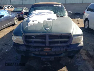 1999 Dodge Dakota SLT with VIN 1B7GG22X0XS239398, listed as a Copart auction lot 80143414 with 147,646 mi miles and Salvage Title. Bid and sale history available at DreamBid. Image 5.
