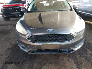 2016 Ford Focus SE with VIN 1FADP3F28GL330815, listed as a IAAI auction lot 41696821 with 125,247 mi miles. Bid and sale history available at carsss.com. Image 6.