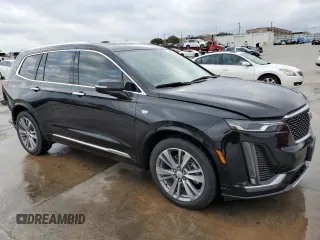 2021 Cadillac XT6 Premium Luxury z VIN 1GYKPCRS6MZ207546, wystawiony jako Copart lot #85995814 z przebiegiem 30 885 mil mil oraz Czysty tytuł • Clean title. Historia ofert i sprzedaży dostępna na DreamBid. Obrazek 4.