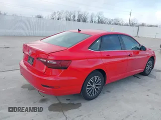 2019 Volkswagen Jetta S z VIN 3VWC57BUXKM099060, wystawiony jako IAAI lot #41478697 z przebiegiem 134 363 mil mil oraz . Historia ofert i sprzedaży dostępna na DreamBid. Obrazek 4.