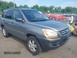 2006 Kia Sportage LX z VIN KNDJE723467218223, wystawiony jako IAAI lot #42520812 z przebiegiem 199 798 mil mil oraz . Historia ofert i sprzedaży dostępna na DreamBid. Obrazek 1.