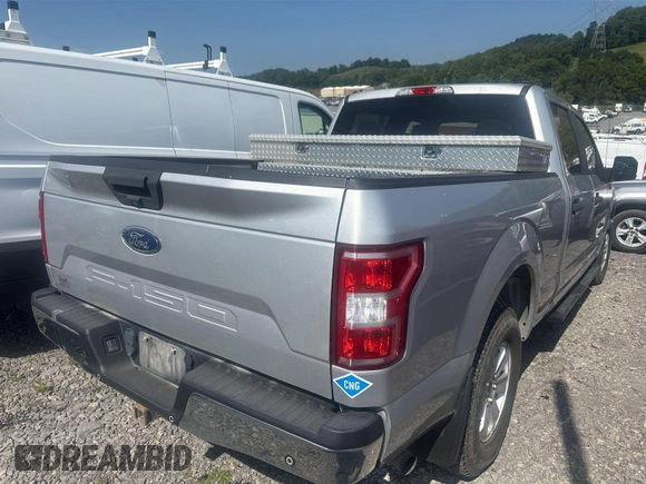 2018 Ford F-150 XL z VIN 1FTFW1E53JKF62418, wystawiony jako IAAI lot #42854294 z przebiegiem 103 964 mil mil oraz . Historia ofert i sprzedaży dostępna na DreamBid. Obrazek 29.