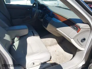 2003 Cadillac DeVille with VIN 1G6KD54Y43U136688, listed as a IAAI auction lot 41860719 with 124,230 mi miles. Bid and sale history available at carsss.com. Image 5.