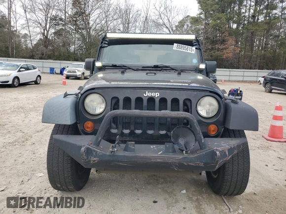 2012 Jeep Wrangler Sport with VIN 1C4GJWAG6CL167329, listed as a Copart auction lot 88895815 with 147,448 mi miles and Clean Title. Bid and sale history available at DreamBid. Image 5.