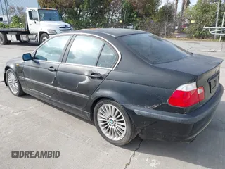 2003 BMW 3 Series 330i with VIN WBAEV534X3KM29039, listed as a IAAI auction lot 41850238 with 127,791 mi miles. Bid and sale history available at carsss.com. Image 3.