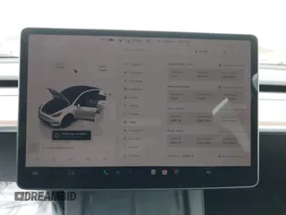 2024 Tesla Model Y Performance with VIN 7SAYGDEF4RA278532, listed as a IAAI auction lot 41511769 with 9,487 mi miles and . Bid and sale history available at DreamBid. Image 7.