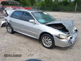 2002 Honda Accord SE z VIN 1HGCG56792A109226, wystawiony jako IAAI lot #42155995 z przebiegiem 238 789 mil mil oraz . Historia ofert i sprzedaży dostępna na DreamBid. Obrazek 1.