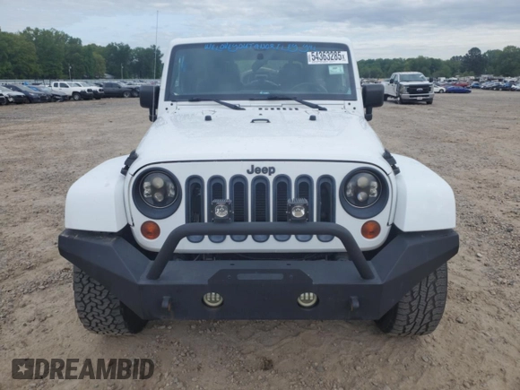 2012 Jeep Wrangler Unlimited Sahara with VIN 1C4HJWEG8CL126053, listed as a Copart auction lot 54363285 with 88,014 mi miles and Salvage title. Bid and sale history available at DreamBid. Image 5.