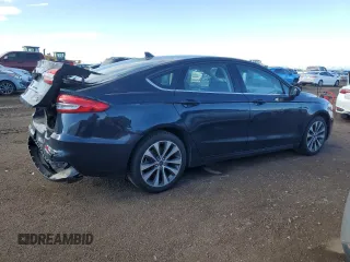 2020 Ford Fusion SE z VIN 3FA6P0T9XLR236729, wystawiony jako Copart lot #47771045 z przebiegiem 54 947 mil mil oraz Szkoda całkowita • Salvage title. Historia ofert i sprzedaży dostępna na DreamBid. Obrazek 3.