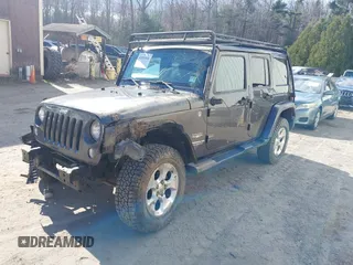 2014 Jeep Wrangler Unlimited Sahara с VIN 1C4BJWEG3EL267279, выставлен на аукционе IAAI как лот 42083836 с пробегом 81 796 миль миль и . История ставок и продаж доступна на DreamBid. Изображение 17.