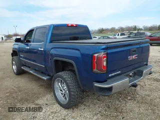 2016 GMC Sierra 1500 SLT with VIN 3GTU2NEC5GG246818, listed as a IAAI auction lot 41914533 with 122,298 mi miles and . Bid and sale history available at DreamBid. Image 3.