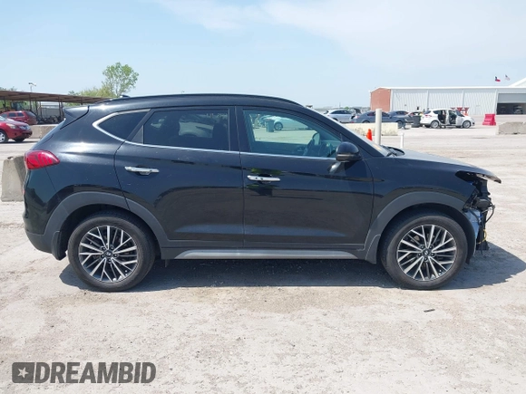 2021 Hyundai Tucson Ultimate with VIN KM8J33ALXMU289579, listed as a IAAI auction lot 42027719 with 95,989 mi miles and . Bid and sale history available at DreamBid. Image 13.