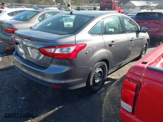 2012 Ford Focus SE with VIN 1FAHP3F29CL327580, listed as a IAAI auction lot 41882318 with 156,511 mi miles. Bid and sale history available at carsss.com. Image 4.