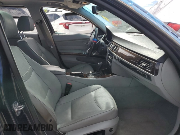 2010 BMW 3 Series 335i xDrive with VIN WBAPL3C59AA407936, listed as a Copart auction lot 70455304 with 89,675 mi miles and Salvage title. Bid and sale history available at DreamBid. Image 7.