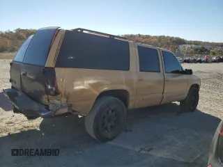 1994 GMC Suburban z VIN 1GKFK16K0RJ751324, wystawiony jako Copart lot #77827404 z przebiegiem 219 786 mil mil oraz Szkoda całkowita • Salvage title. Historia ofert i sprzedaży dostępna na DreamBid. Obrazek 3.