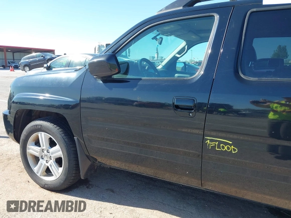 2013 Honda Ridgeline RTL with VIN 5FPYK1F57DB005538, listed as a IAAI auction lot 41985586 with 152,697 mi miles and . Bid and sale history available at DreamBid. Image 6.
