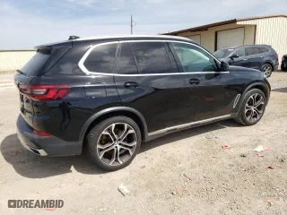2021 BMW X5 sDrive40i with VIN 5UXCR4C05M9G60740, listed as a Copart auction lot 47989915 with 0 mi miles and Salvage Title. Bid and sale history available at carsss.com. Image 3.