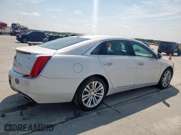 2019 Cadillac XTS Luxury z VIN 2G61M5S39K9100316, wystawiony jako Copart lot #53111435 z przebiegiem 98 854 mil mil oraz Szkoda całkowita • Salvage title. Historia ofert i sprzedaży dostępna na DreamBid. Obrazek 3.