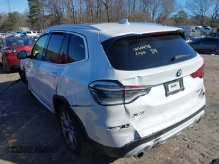 2021 BMW X3 sDrive30i with VIN 5UXTY3C03M9H57528, listed as a IAAI auction lot 41599216 with 89,776 mi miles and . Bid and sale history available at DreamBid. Image 3.