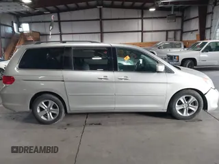 2009 Honda Odyssey Touring с VIN 5FNRL38979B005813, выставлен на аукционе IAAI как лот 41049383 с пробегом 174 897 миль миль и . История ставок и продаж доступна на DreamBid. Изображение 13.