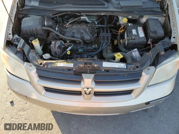 2009 Dodge Caravan z VIN 208HN44EX9R651559, wystawiony jako Copart lot #45508355 z przebiegiem 127 852 mil mil oraz Nie do naprawy • Non repairable. Historia ofert i sprzedaży dostępna na DreamBid. Obrazek 14.