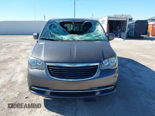 2016 Chrysler Town & Country S with VIN 2C4RC1HG9GR128212, listed as a IAAI auction lot 40858279 with 169,433 mi miles. Bid and sale history available at carsss.com. Image 12.