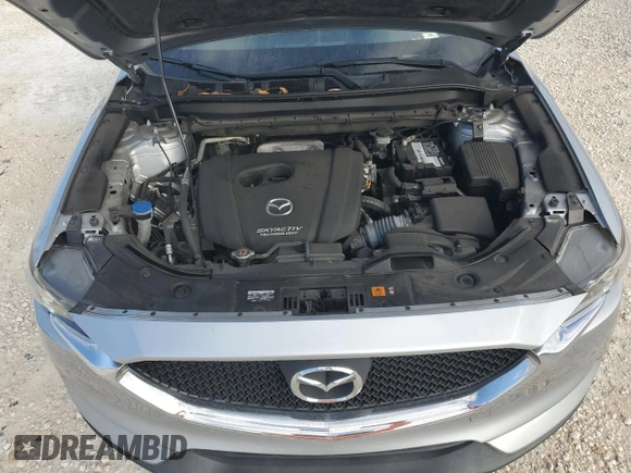 2019 Mazda CX-5 Sport with VIN JM3KFABM2K0690082, listed as a Copart auction lot 53054415 with 50,210 mi miles and Salvage Title. Bid and sale history available at DreamBid. Image 14.