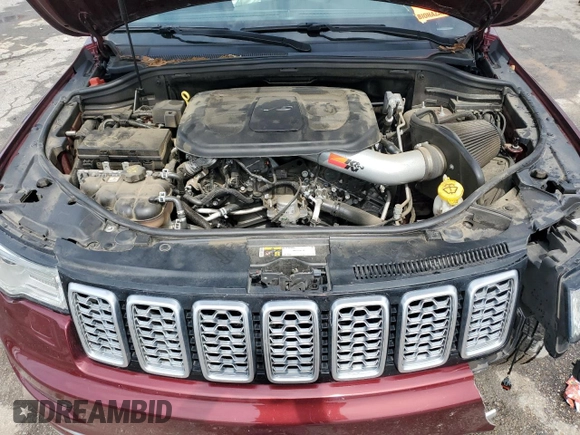 2019 Jeep Grand Cherokee Summit with VIN 1C4RJEJGXKC716175, listed as a Copart auction lot 58656005 with 68,431 mi miles and Salvage title. Bid and sale history available at DreamBid. Image 12.