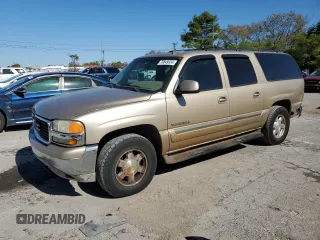 2006 GMC Yukon XL SLT with VIN 1GKFK16Z06J120338, listed as a Copart auction lot 76849334 with 474,979 mi miles and Salvage Title. Bid and sale history available at carsss.com. Image 1.