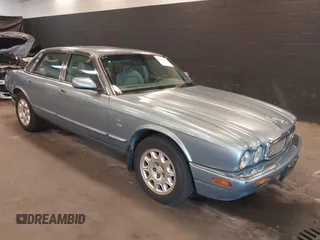 2002 Jaguar XJ 8 with VIN SAJDA14CX2LF48120, listed as a IAAI auction lot 42137958 with 164,754 mi miles and . Bid and sale history available at DreamBid. Image 1.