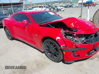 2019 Chevrolet Camaro 1LT z VIN 1G1FA1RX4K0120392, wystawiony jako IAAI lot #41911539 z przebiegiem 119 585 mil mil oraz . Historia ofert i sprzedaży dostępna na DreamBid. Obrazek 1.