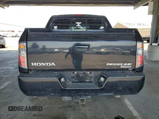 2007 Honda Ridgeline RTL z VIN 2HJYK16517H545034, wystawiony jako Copart lot #59819385 z przebiegiem 258 928 mil mil oraz Czysty tytuł • Clean title. Historia ofert i sprzedaży dostępna na DreamBid. Obrazek 6.