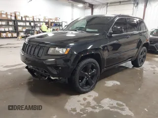 2015 Jeep Grand Cherokee Laredo with VIN 1C4RJFAG3FC115444, listed as a IAAI auction lot 41248211 with 138,828 mi miles. Bid and sale history available at carsss.com. Image 18.