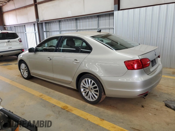 2014 Volkswagen Jetta TDI w/Premium with VIN 3VWLL7AJ9EM261908, listed as a Copart auction lot 60703205 with 128,892 mi miles and Salvage title. Bid and sale history available at DreamBid. Image 2.