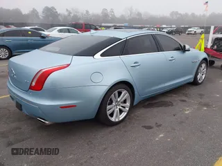 2013 Jaguar XJ with VIN SAJWA2G13DLV57881, listed as a IAAI auction lot 41478667 with 73,764 mi miles. Bid and sale history available at carsss.com. Image 4.