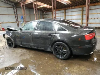 2015 Audi A6 with VIN WAUFFCFC9FN017044, listed as a Copart auction lot 51553694 with 181,733 mi miles and Salvage title. Bid and sale history available at DreamBid. Image 2.