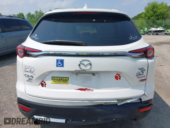 2020 Mazda CX-9 Grand Touring with VIN JM3TCBDY3L0410674, listed as a IAAI auction lot 42389157 with 130,519 mi miles and . Bid and sale history available at DreamBid. Image 16.