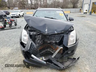 2014 Cadillac SRX Premium Collection z VIN 3GYFNGE3XES577569, wystawiony jako Copart lot #48399735 z przebiegiem Nie podano mil oraz Szkoda całkowita • Salvage title. Historia ofert i sprzedaży dostępna na DreamBid. Obrazek 5.