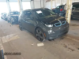 2015 BMW i3 z VIN WBY1Z2C5XFV556131, wystawiony jako IAAI lot #42050070 z przebiegiem 60 889 mil mil oraz . Historia ofert i sprzedaży dostępna na DreamBid. Obrazek 1.