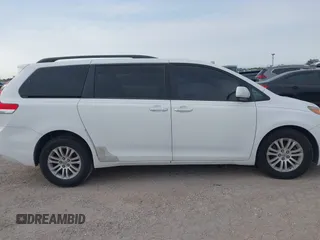 2011 Toyota Sienna XLE AAS with VIN 5TDYK3DC8BS108689, listed as a IAAI auction lot 42308965 with 179,524 mi miles and . Bid and sale history available at DreamBid. Image 13.