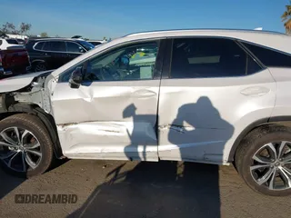 2022 Lexus RX with VIN 2T2HGMDA8NC074588, listed as a IAAI auction lot 41828234 with 106,845 mi miles. Bid and sale history available at carsss.com. Image 15.