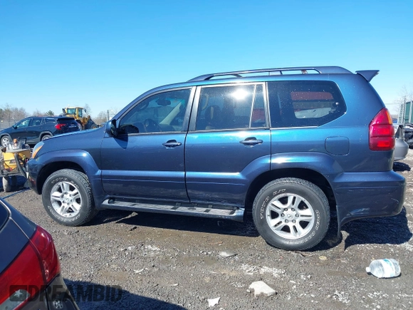 2005 Lexus GX with VIN JTJBT20XX50081621, listed as a IAAI auction lot 41661384 with 208,071 mi miles. Bid and sale history available at carsss.com. Image 14.