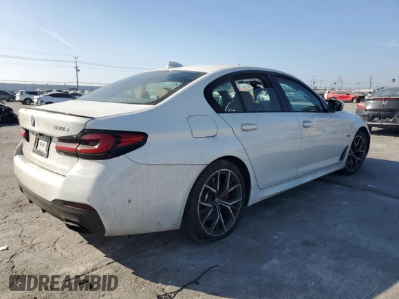 2023 BMW 5 Series 530e with VIN WBA13AG02PCL73814, listed as a Copart auction lot 86818824 with Not provided miles and Salvage title. Bid and sale history available at DreamBid. Image 3.