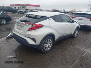 2021 Toyota C-HR LE with VIN JTNKHMBX2M1110644, listed as a IAAI auction lot 41115935 with 75,413 mi miles. Bid and sale history available at carsss.com. Image 4.