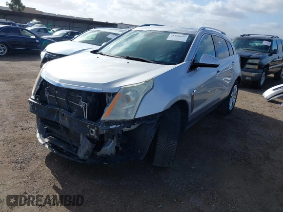 2014 Cadillac SRX Performance Collection with VIN 3GYFNCE39ES544135, listed as a IAAI auction lot 41808644 with 145,772 mi miles and . Bid and sale history available at carsss.com. Image 18.