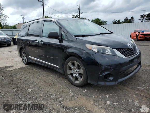 2014 Toyota Sienna SE with VIN 5TDXK3DC7ES425945, listed as a Copart auction lot 63067955 with 173,815 mi miles and Salvage title. Bid and sale history available at DreamBid. Image 4.