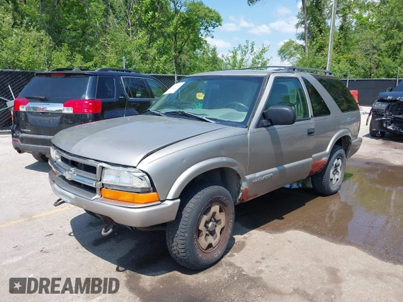 1999 Chevrolet Blazer LS с VIN 1GNCT18W3XK116060, выставлен на аукционе IAAI как лот 42213762 с пробегом 216 788 миль миль и . История ставок и продаж доступна на DreamBid. Изображение 2.