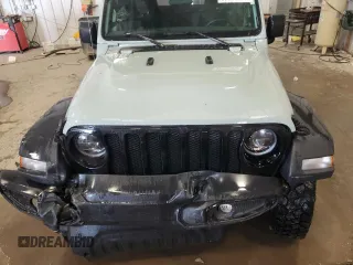 2023 Jeep Wrangler Sport with VIN 1C4HJXAG7PW617021, listed as a Copart auction lot 59928305 with 8,503 mi miles and Salvage title. Bid and sale history available at DreamBid. Image 12.