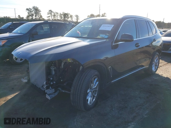 2023 BMW X5 xDrive40i with VIN 5UXCR6C01P9P96005, listed as a IAAI auction lot 41415624 with 15,879 mi miles and . Bid and sale history available at DreamBid. Image 2.